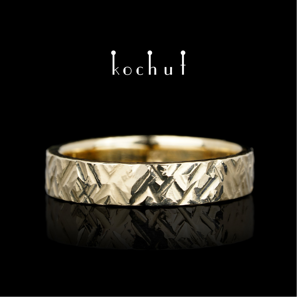 Wedding ring in forging Storm. Yellow gold