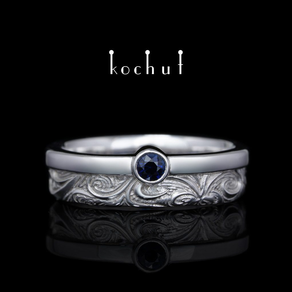 Wedding ring «In joy and sorrow: halves». White gold, sapphire, white rhodium
