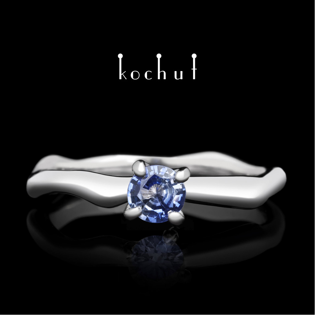 Engagement ring «Gentle hugs». White gold, cornflower sapphire, white rhodium